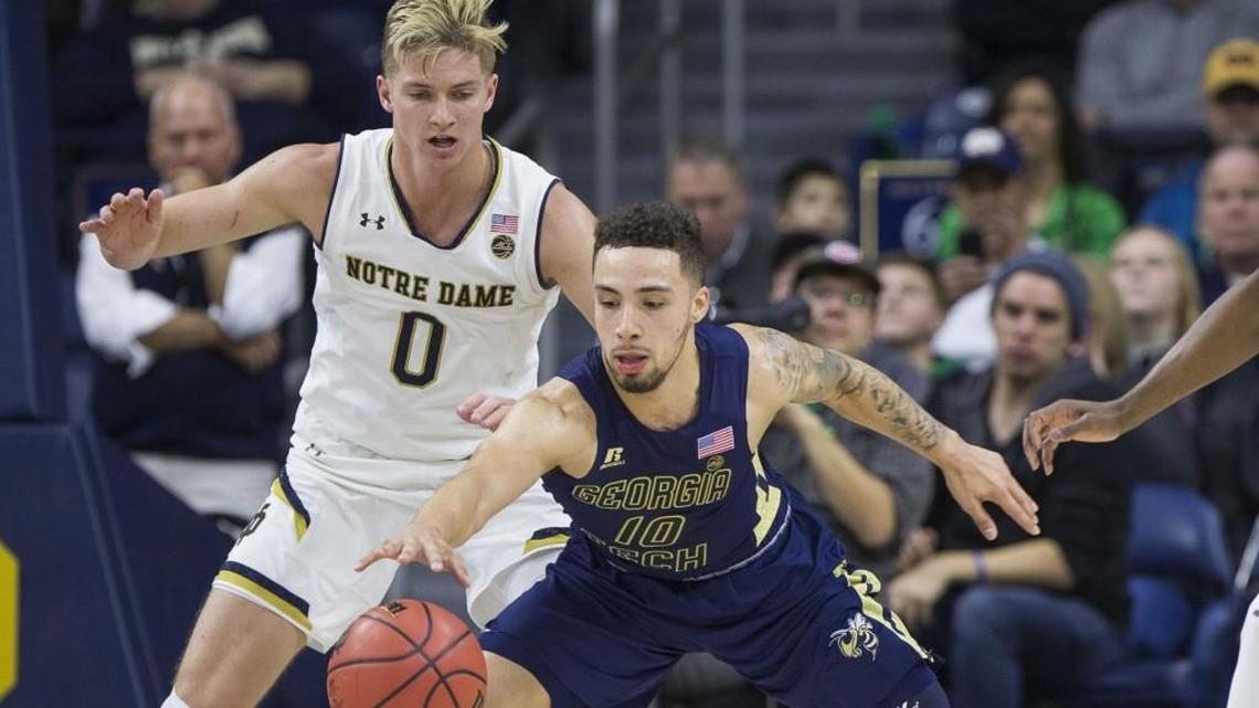 Georgia Tech’s Jose Alvarado (10) gains control of the ball in front of Notre Dame’s Rex Pflueger (0) during the second half of a game in December.