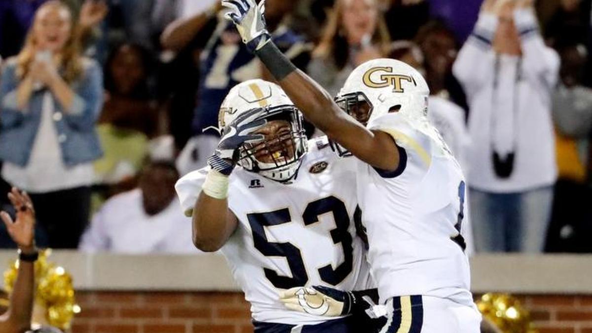 Georgia Tech's Qua Searcy, right, celebrates with teammate Jahaziel Lee (53) after Searcy scored a touchdown in the third quarter of an NCAA college football game against Wake Forest in Atlanta, Saturday, Oct. 21, 2017.