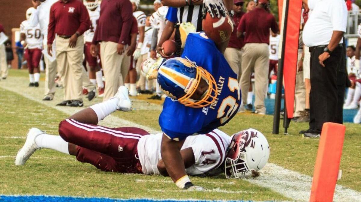 Fort Valley’s Chauncey Jackson (21) leaps into the end zone and scores against Morehouse earlier this season.