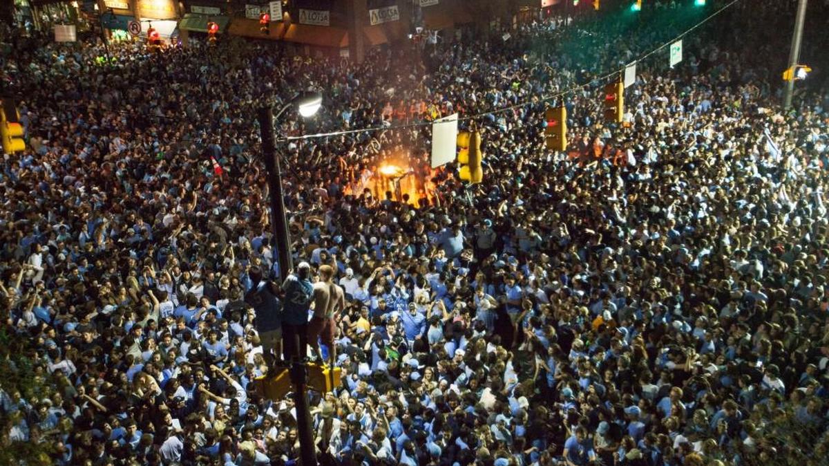 North Carolina fans celebrate on Franklin Street following its victory over Gonzaga in the NCAA college basketball championship Monday in Chapel Hill, N.C.