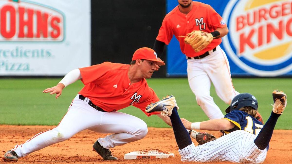 Mercer's Matt Meeder (6) tags ETSU's Seth Cunningham (12) out at second base during a steal attempt. ETSU topped Mercer 9-2 on Sunday.