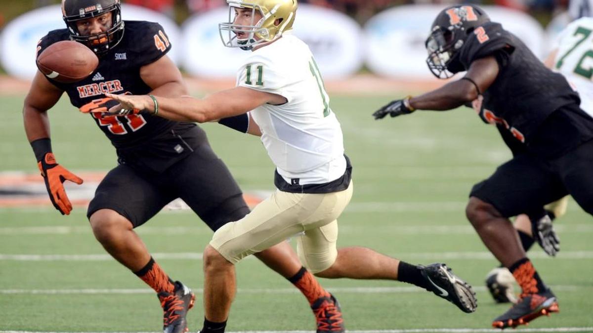 Mercer's Isaiah Buehler, left, and the Bears’ defense will face an option offense for the third time this season Saturday against The Citadel.
