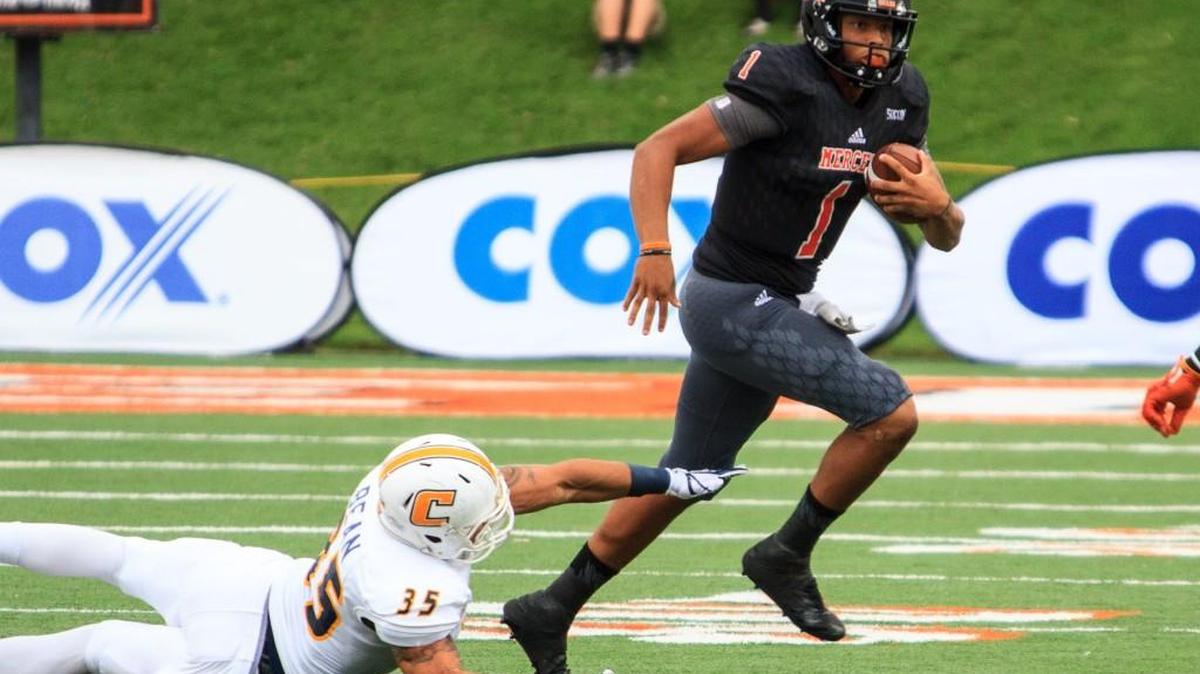 Mercer quarterback Kaelan Riley (1) keeps the ball for a short gain against Chattanooga in October.