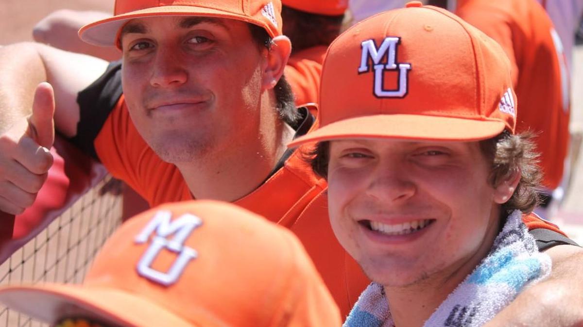 Mercer catcher Charlie Madden, right, and the Bears host UNC Greensboro in Southern Conference play this weekend.