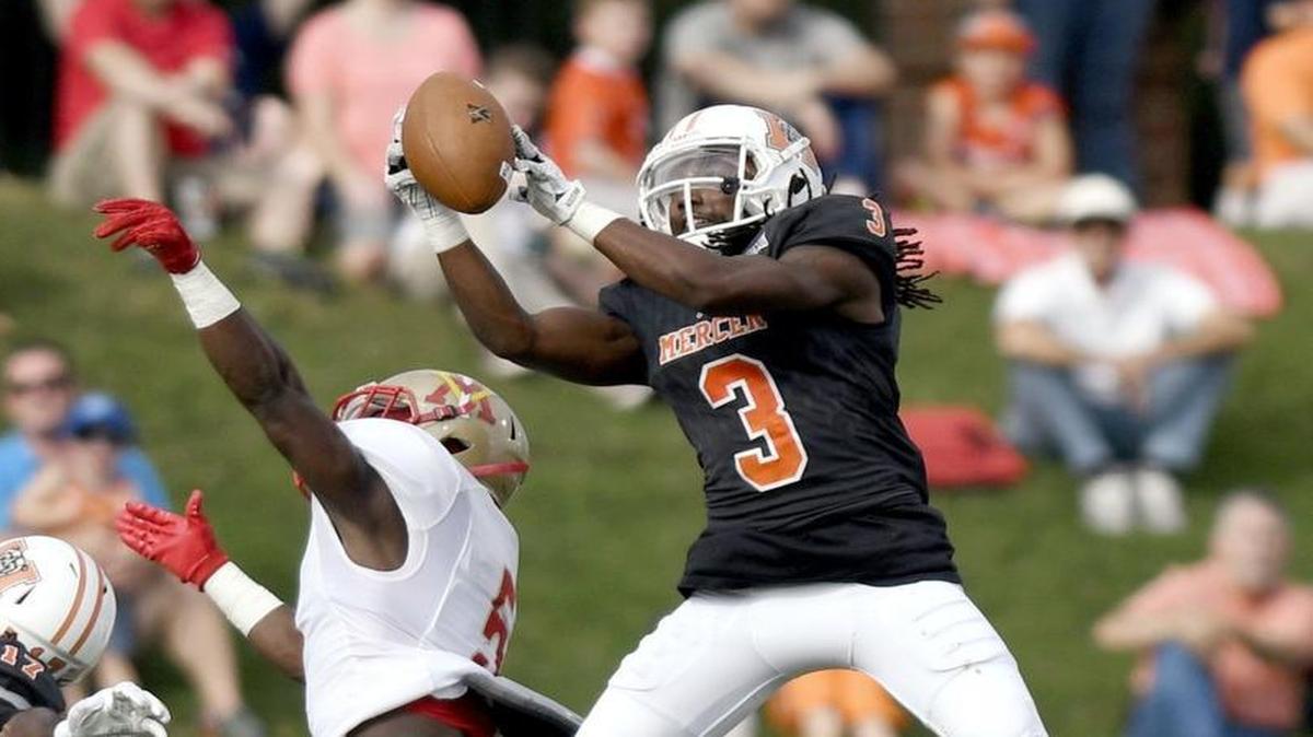 Mercer defensive back Stephen Houzah (3) intercepts a pass intended for VMI's Rohan Martin (5) during their game Saturday.