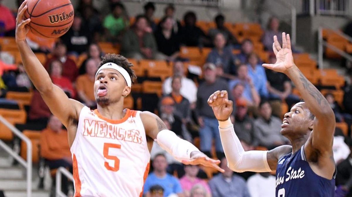 Mercer guard Jordan Strawberry (5) puts up a shot in the lane during the game against Jackson State on Tuesday night.