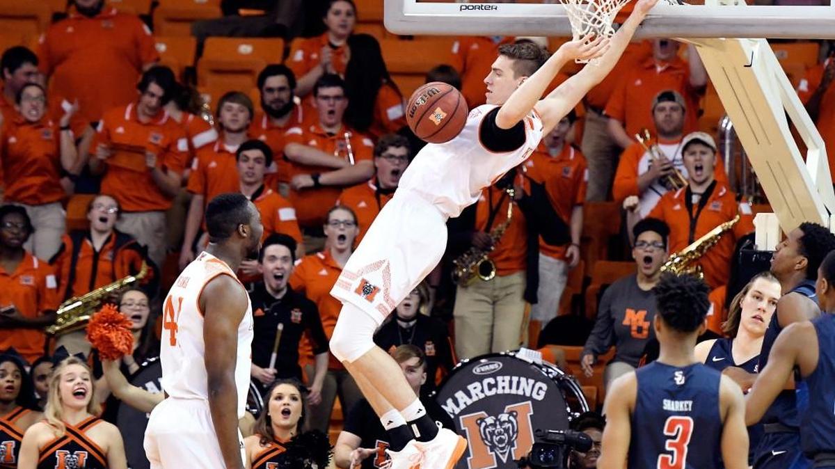 Mercer forward Cory Kilby (1) throws down a dunk during a Bears game against Samford last season.