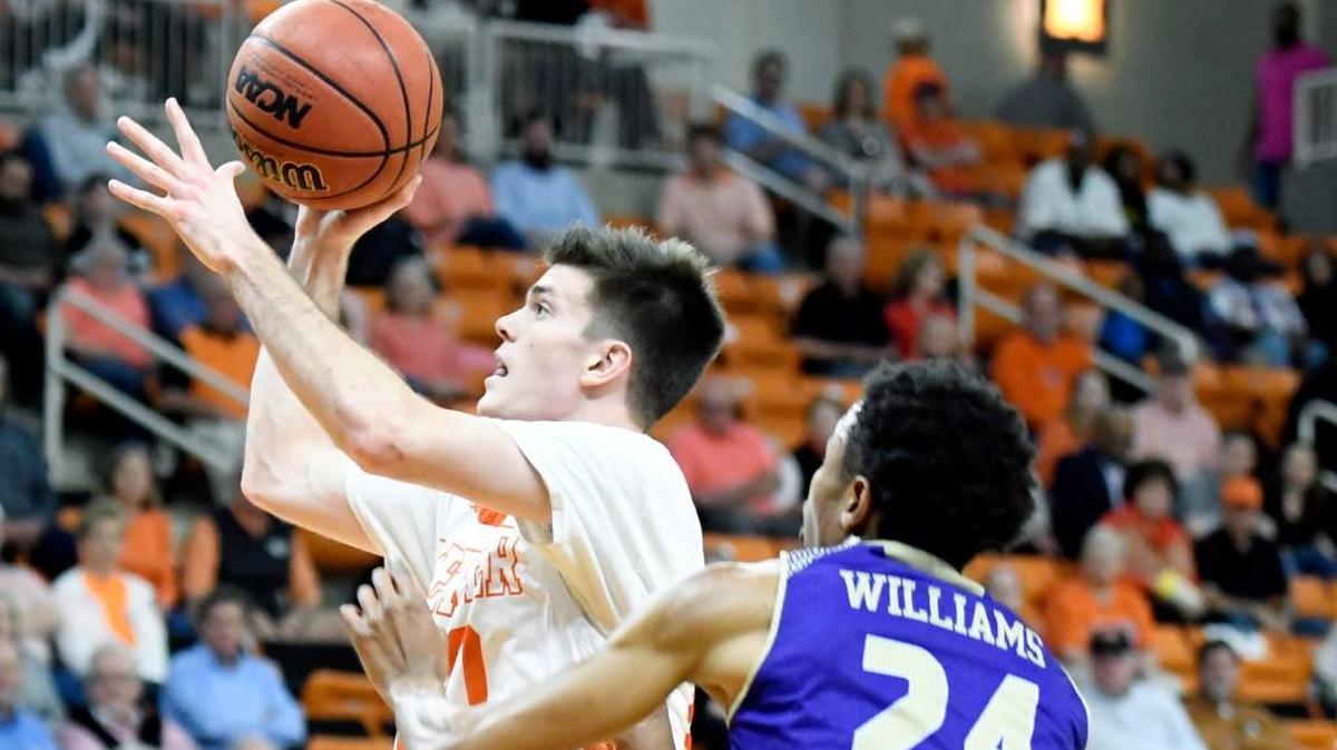 Mercer guard Ross Cummings (20) puts up a shot during the Bears’ game against Western Carolina on Feb. 20. and will need to be a key cog in the SoCon tournament.