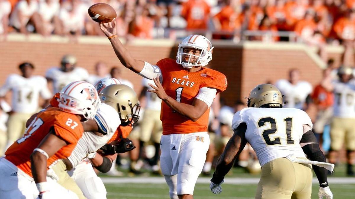 Mercer quarterback Kaelan Riley (1) throws the ball downfield during their game against Wofford Saturday.