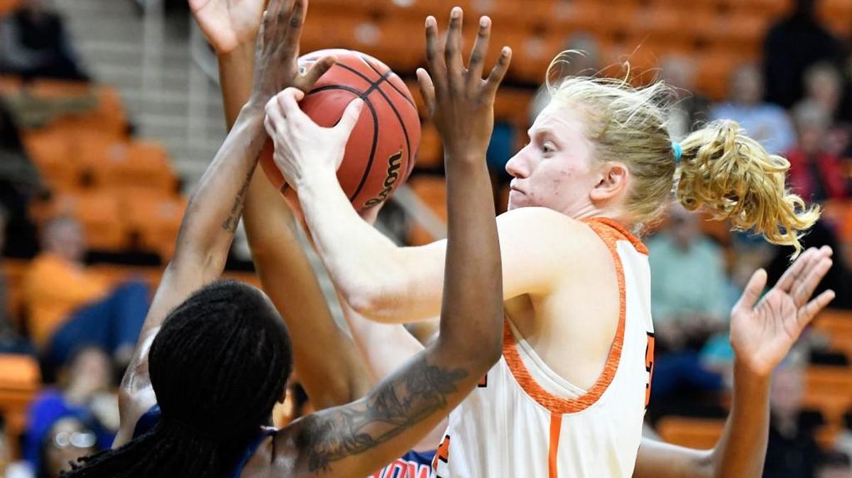 Mercer forward Amanda Thompson (2) grabs an offensive rebound during her team’s game against Howard on Thursday night.