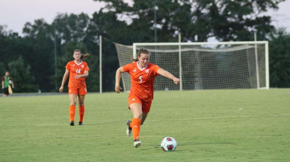 Freshman Sarah Adcock, front, scored her first collegiate goal Sunday as Mercer beat Montevallo 1-0.