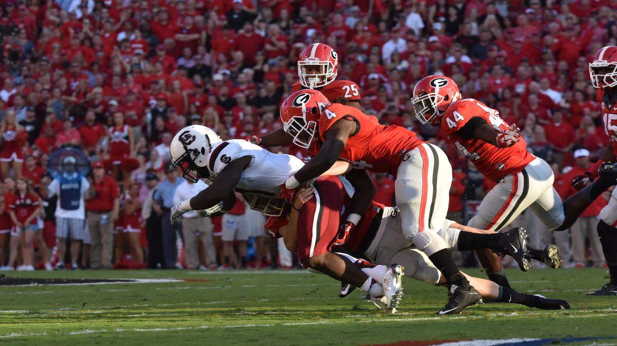 Georgia running back Keith Marshall records a special teams tackle against South Carolina. 