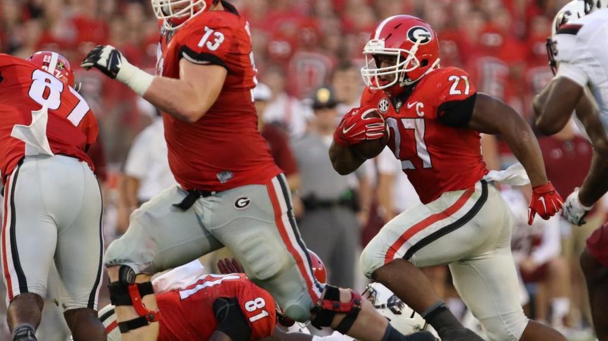 Georgia offensive lineman Greg Pyke (73), tailback Nick Chubb (27).