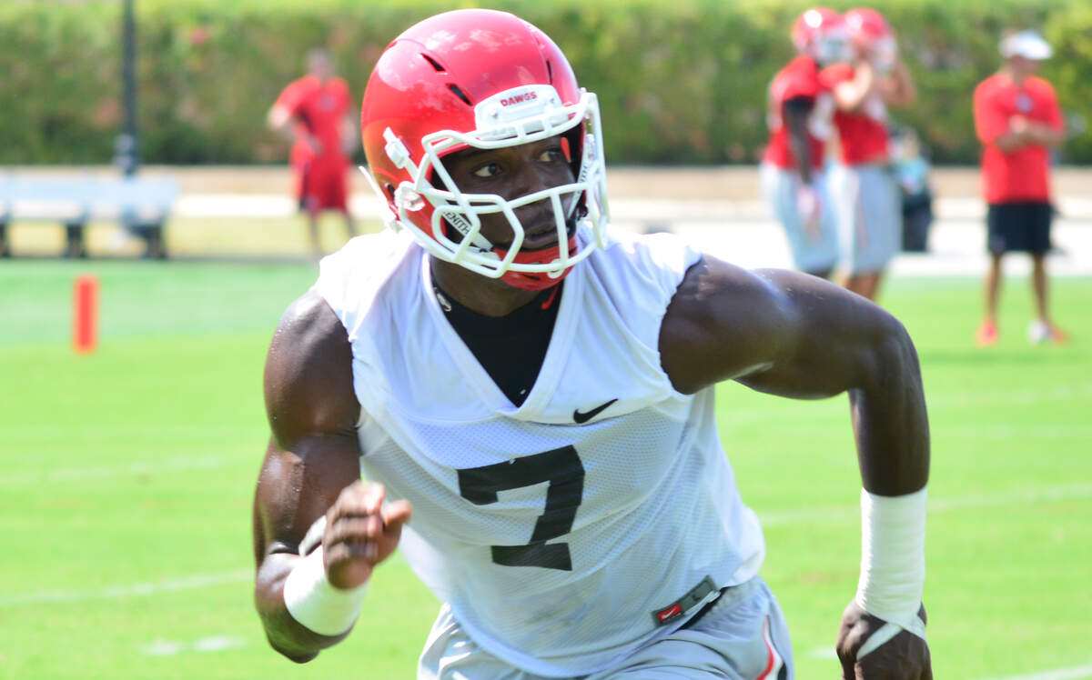Georgia outside linebacker Lorenzo Carter participates in a drill during a practice. 