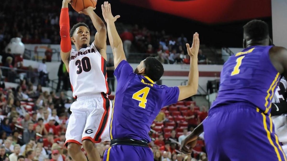 Georgia guard J. J. Frazier (30) hits a three point shot during Saturday’s game against LSU.