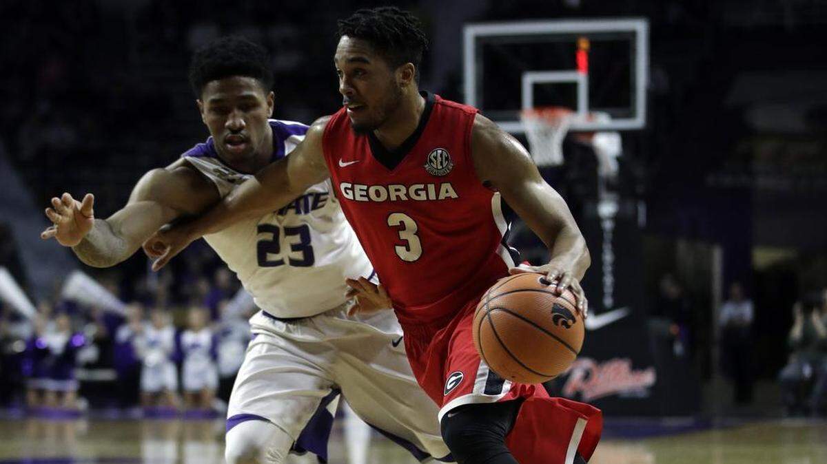 Georgia guard Juwan Parker drives against Kansas State.