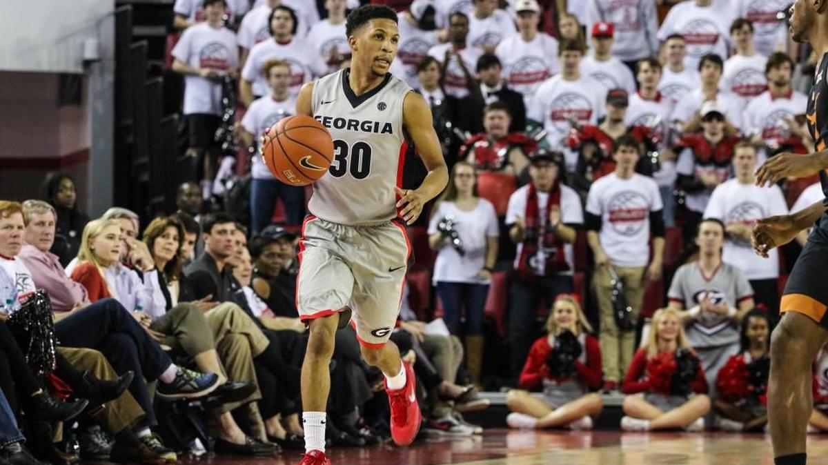 Georgia's J.J. Frazier (30) dribbles down the court during last Saturday’s win over Texas.