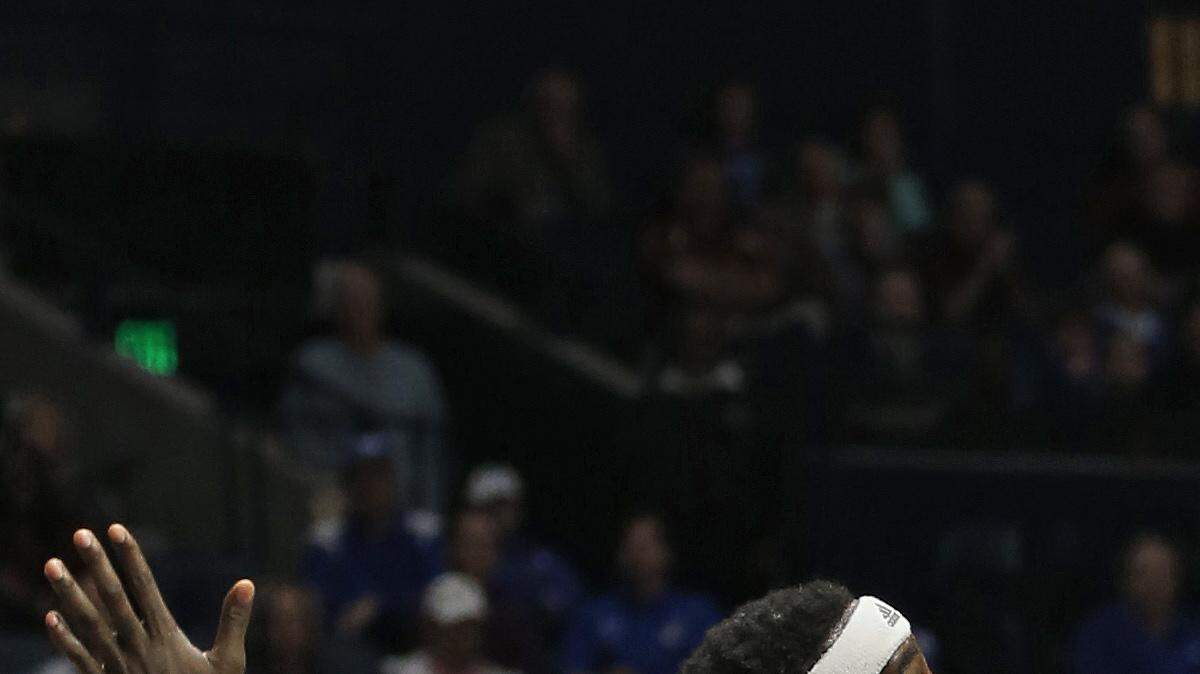 Georgia's J.J. Frazier puts up a shot over Mississippi State's Gavin Ware. 