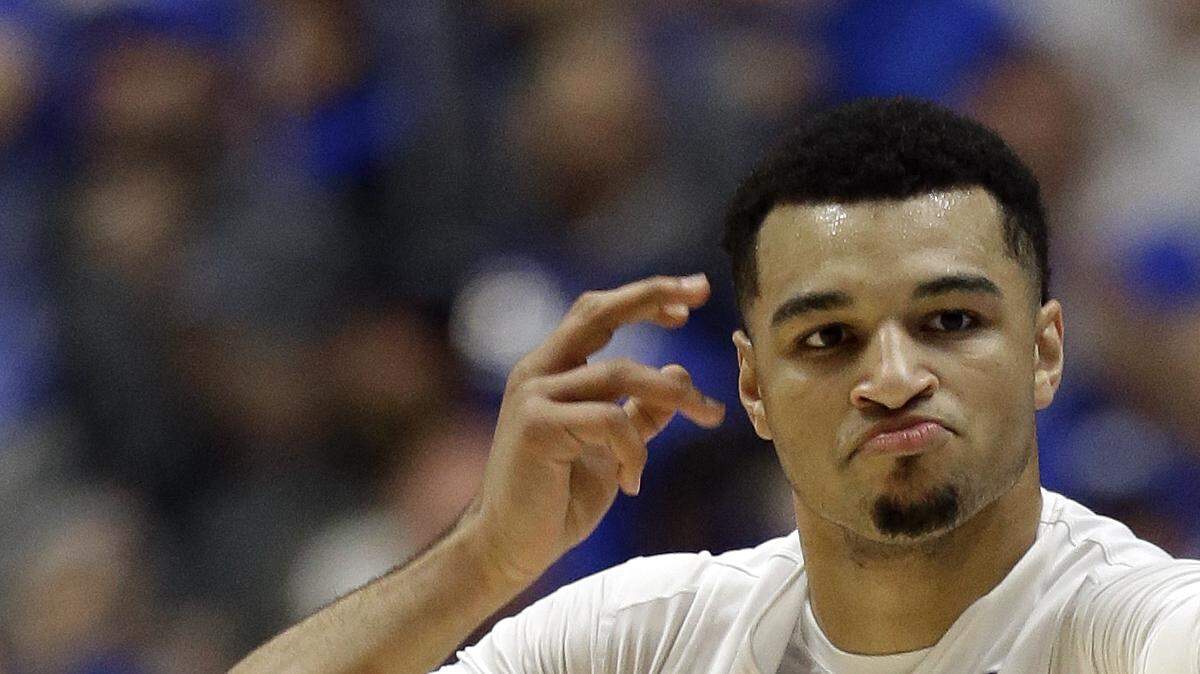 Jamal Murray celebrates after a made 3-pointer in the semifinals of the SEC Tournament. 