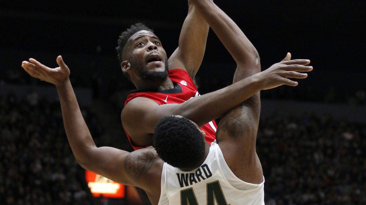 Yante Maten puts up a shot during an exhibition against Michigan State. 