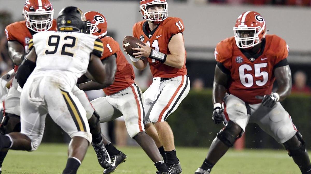 Georgia quarterback Jake Fromm (11) looks downfield before throwing a pass during the Bulldogs' opening game against Appalachian State Saturday.