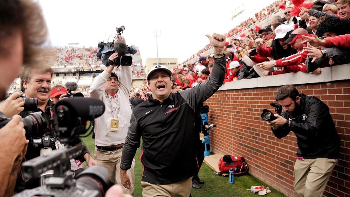 Georgia head coach Kirby Smart acknowledges the fans after a 38-7 win over Georgia Tech.