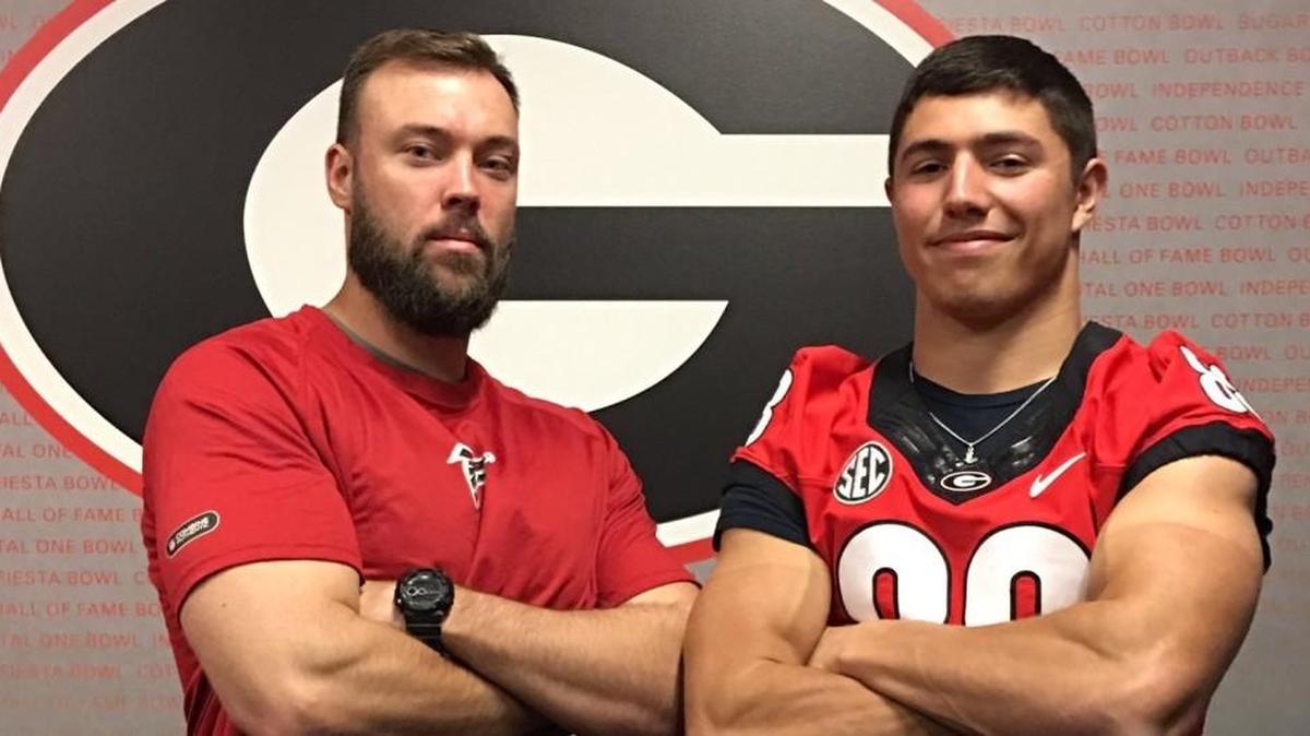 Ben Bresnahan poses for a photo during a Georgia visit with his personal tight ends coach Kyle Auffray.