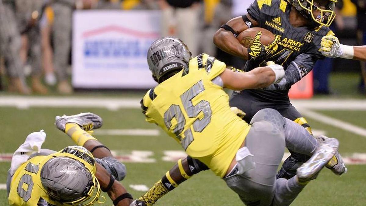 Five-star athlete Mecole Hardman (right) tries to make a play in the U.S. Army All-American Bowl.