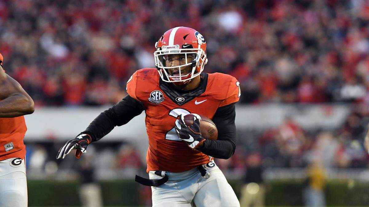 Maurice Smith returns an interception against Auburn for a touchdown. 