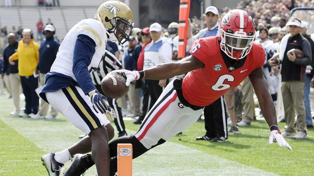 Javon Wims reaches the football over the pylon in an attempt to score a touchdown against Georgia Tech.