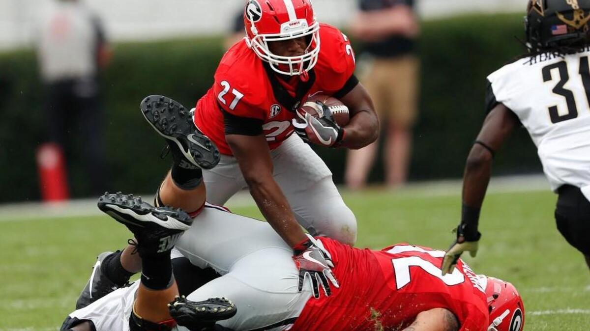Georgia running back Nick Chubb (27) runs against Vanderbilt in the first half.