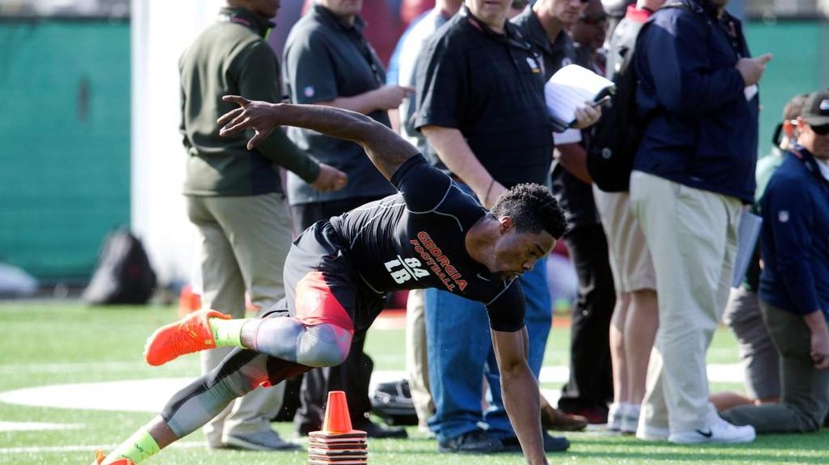 Leonard Floyd runs a drill in front of NFL football scouts during Georgia's Pro Day.