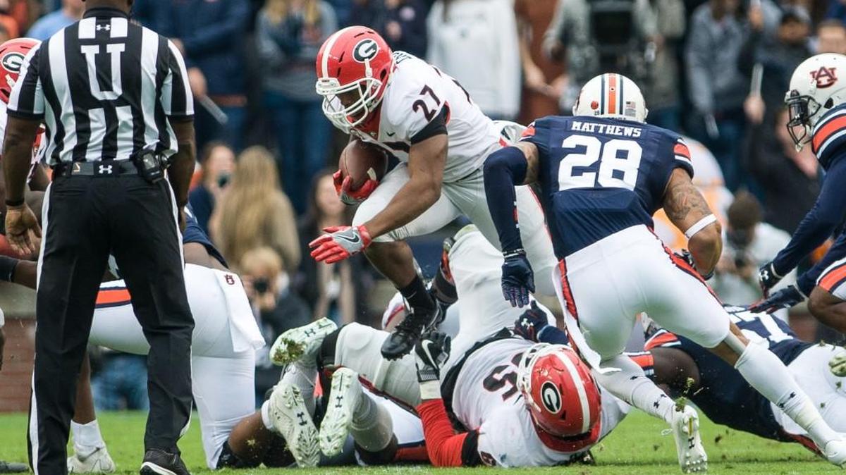 Nick Chubb carries the ball against Auburn.