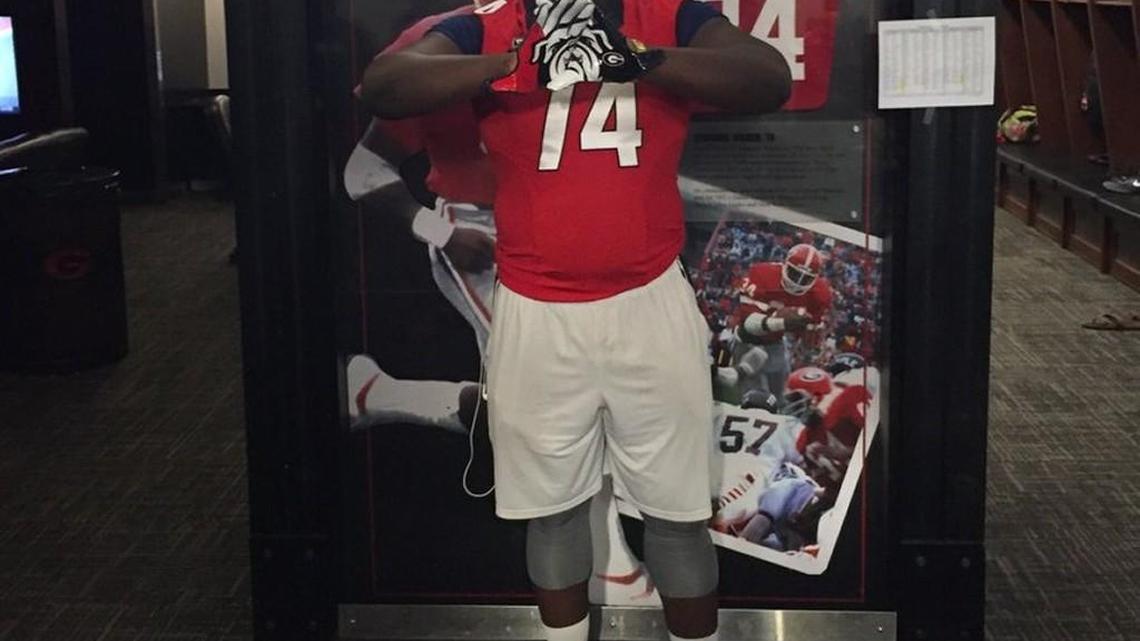 Offensive tackle prospect Isaiah Wilson poses for a picture at Butts-Mehre Heritage Hall.