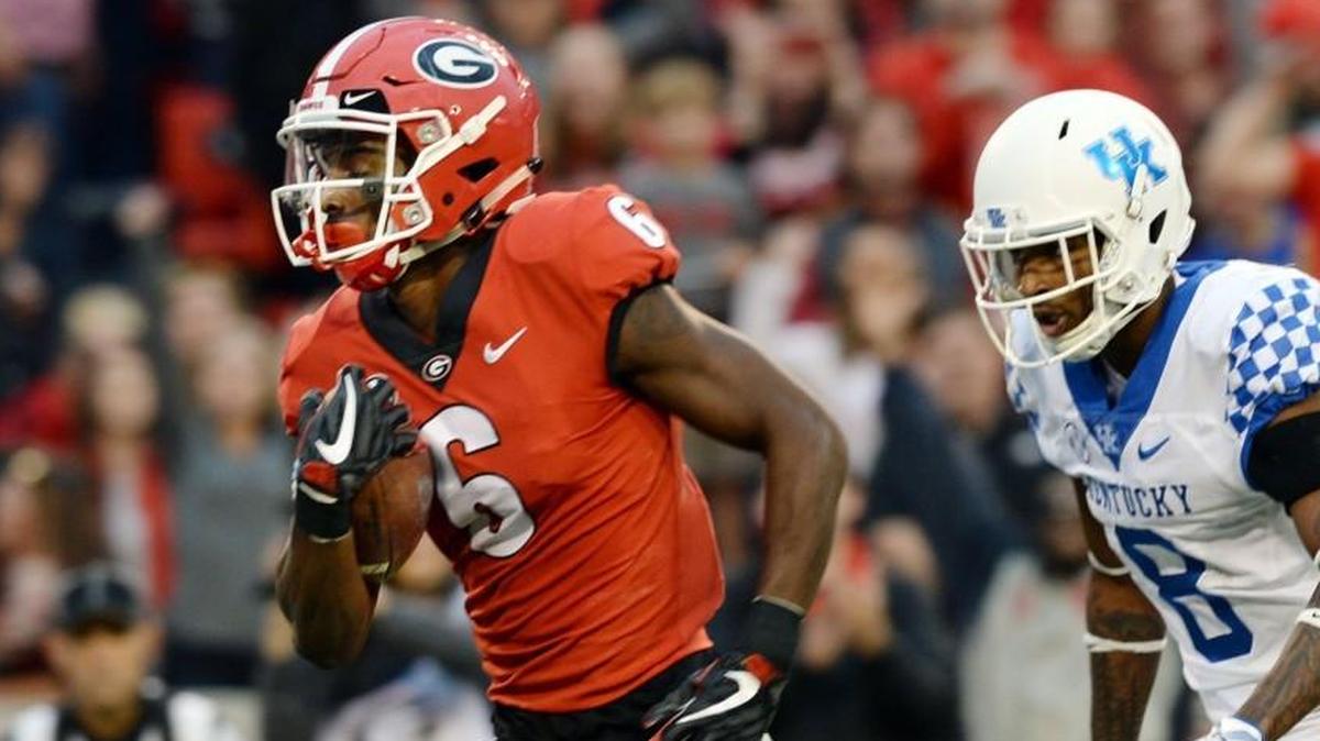 Georgia's Javon Wims takes a 27-yard pass from Jake Fromm to the end zone to give Georgia a 14-6 lead over Kentucky.