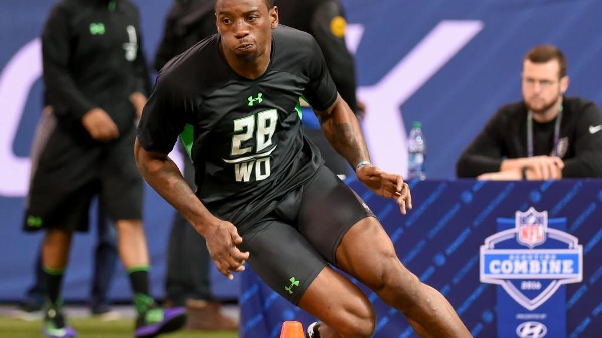 Georgia receiver Malcolm Mitchell runs a drill at the NFL football scouting combine.