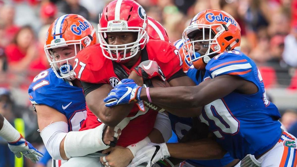Georgia running back Nick Chubb fights for yards against Florida.