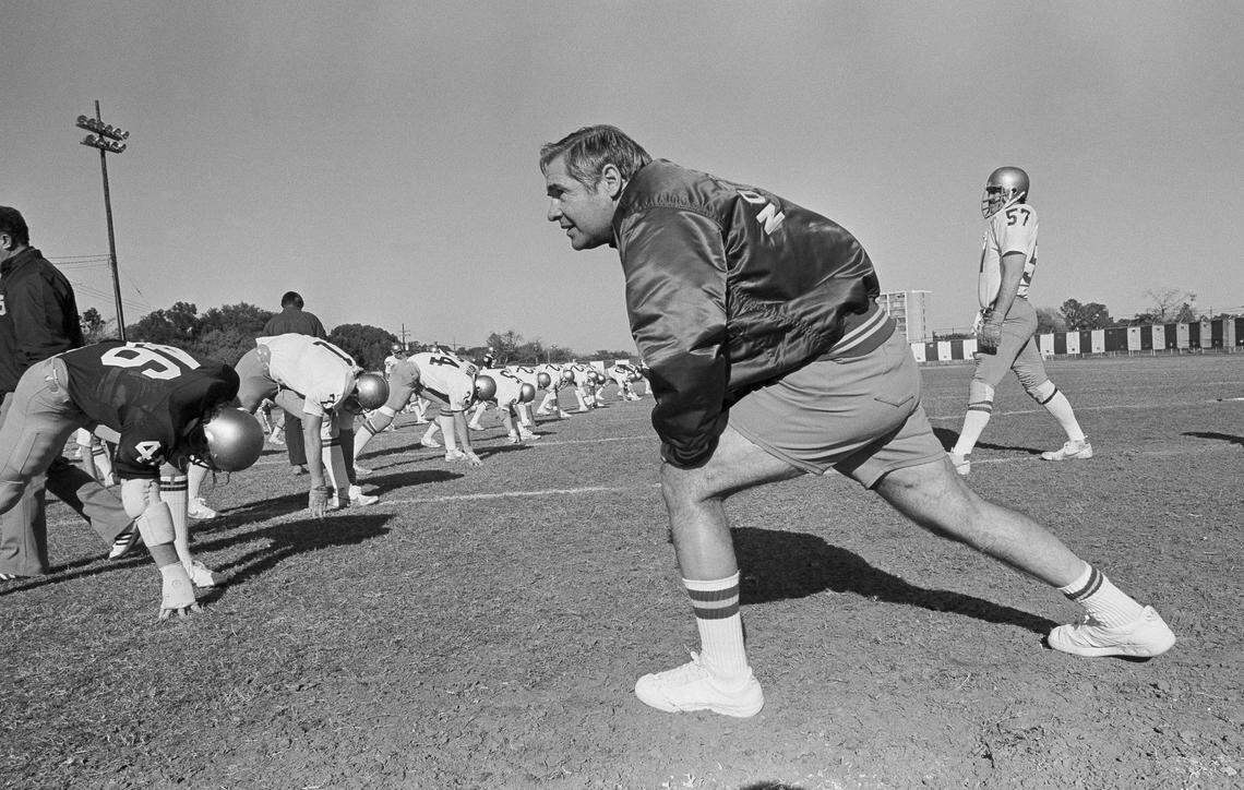 Notre Dame head coach Dan Devine leads his team in warm-ups at a Sugar Bowl practice on Dec. 28, 1980. 