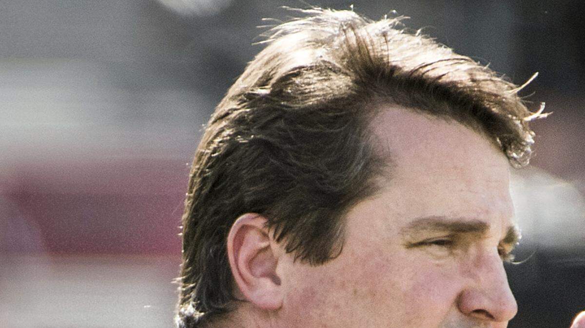Will Muschamp (left) told Kirby Smart (right) that UGA won't come close to 93,000 people at this year's G-Day spring game. 