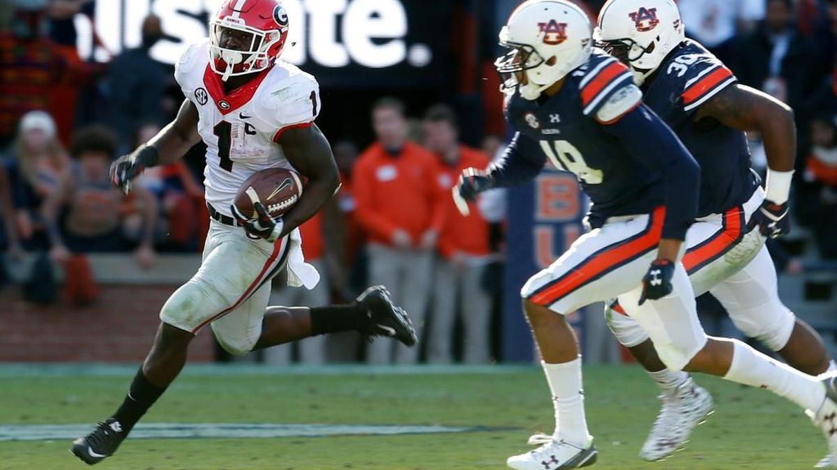 Georgia running back Sony Michel (1) carries the ball in a 2015 game against Auburn.
