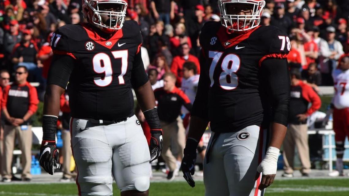 John Atkins (97) and Trenton Thompson (78) will be key components on Georgia’s defensive line in 2017.