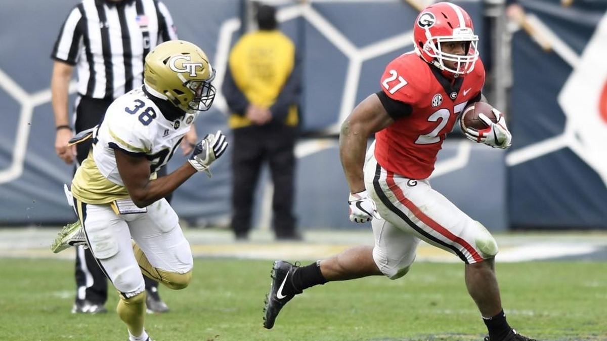 Georgia's Nick Chubb (27) rushes against Georgia Tech.