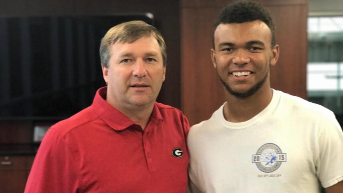 Dominick Blaylock, posing with Georgia head coach Kirby Smart, gave his committment to the Bulldogs Sunday.