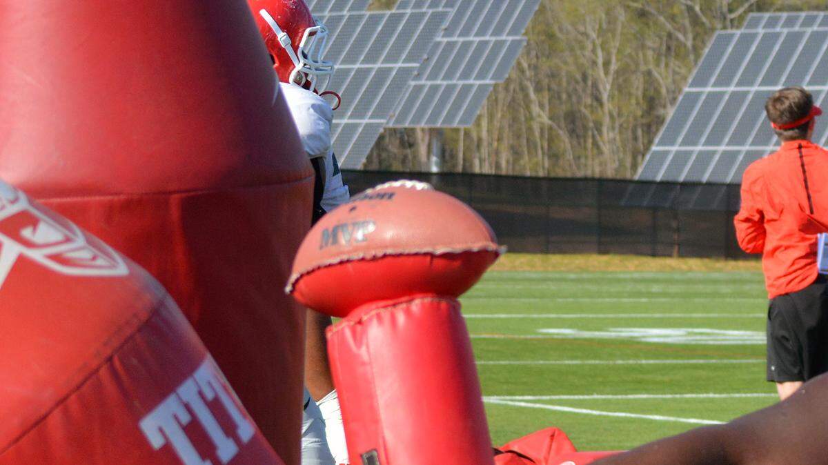 Julian Rochester goes through a drill during spring practice. 
