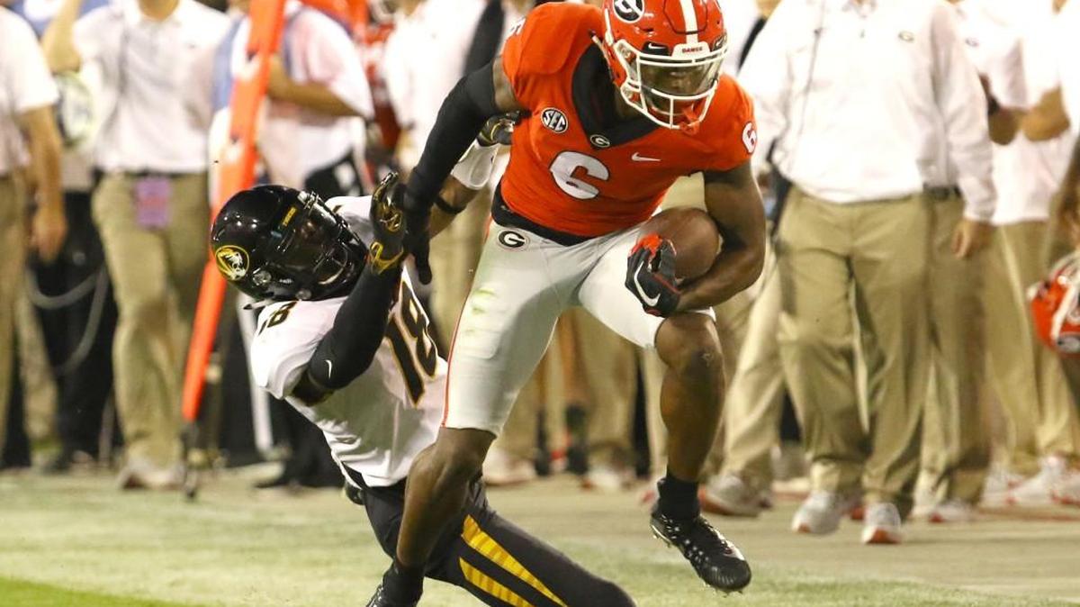 Georgia receiver Javon Wims comes up with a reception against Missouri.