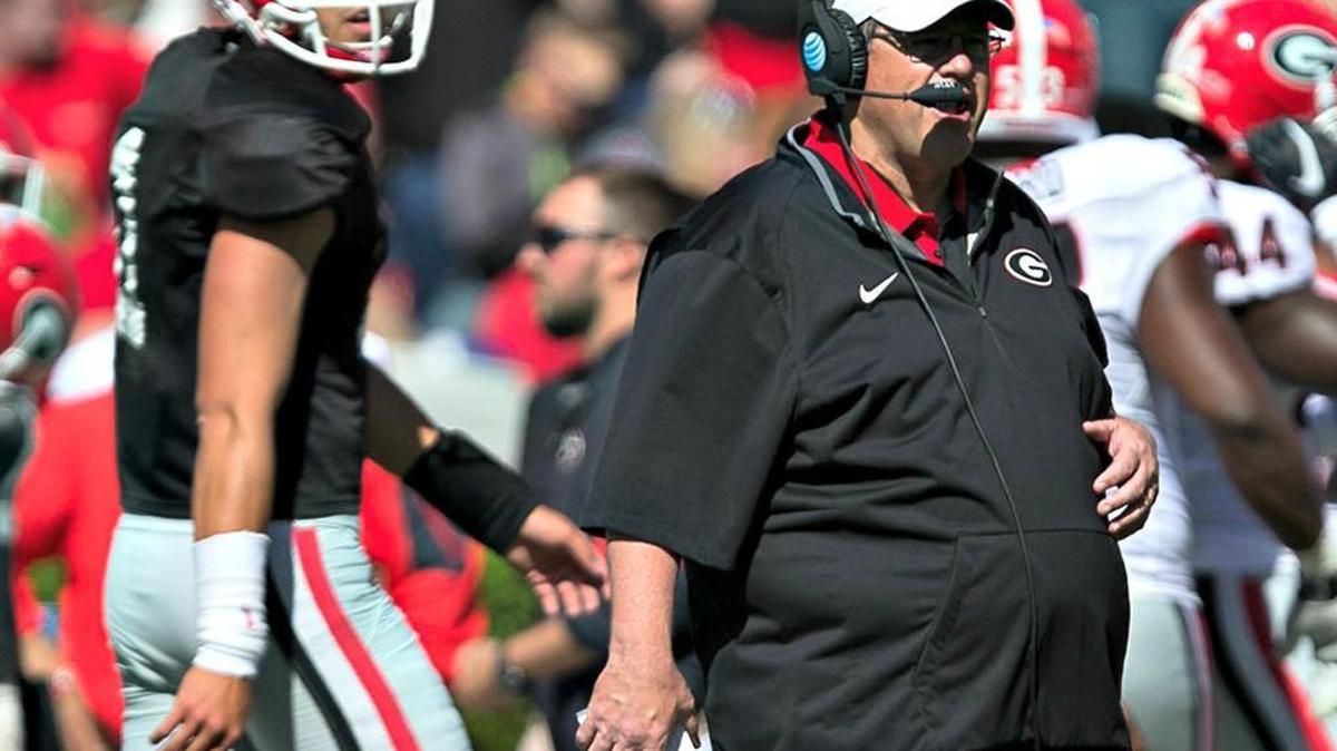 Jim Chaney, right, is entering his first season as Georgia’s offensive coordinator.