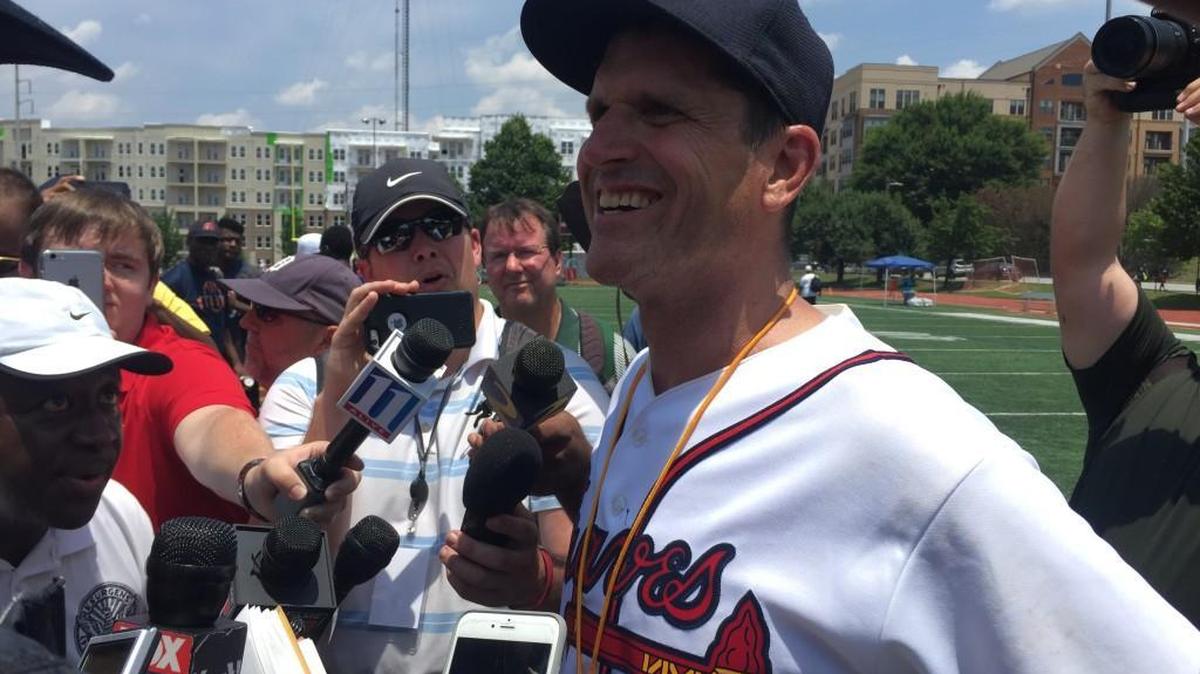 Michigan head coach Jim Harbaugh wore a Hank Aaron Braves jersey during his appearance at Cedar Grove’s satellite camp.