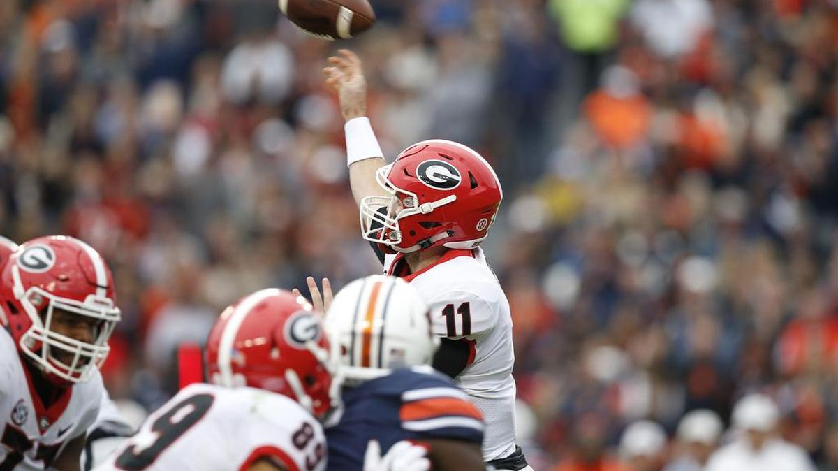 Georgia quarterback Jake Fromm throws the ball against Auburn during the first half.