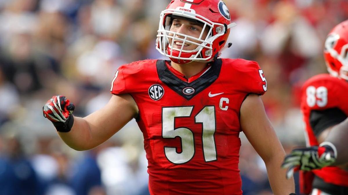Linebacker Jake Ganus shows emotion in the second half of Georgia’s win over Georgia Tech.