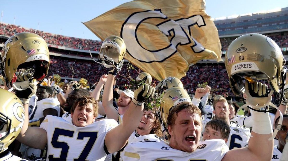 Georgia Tech players celebrate their 28-27 win over Georgia on Saturday in Athens.
